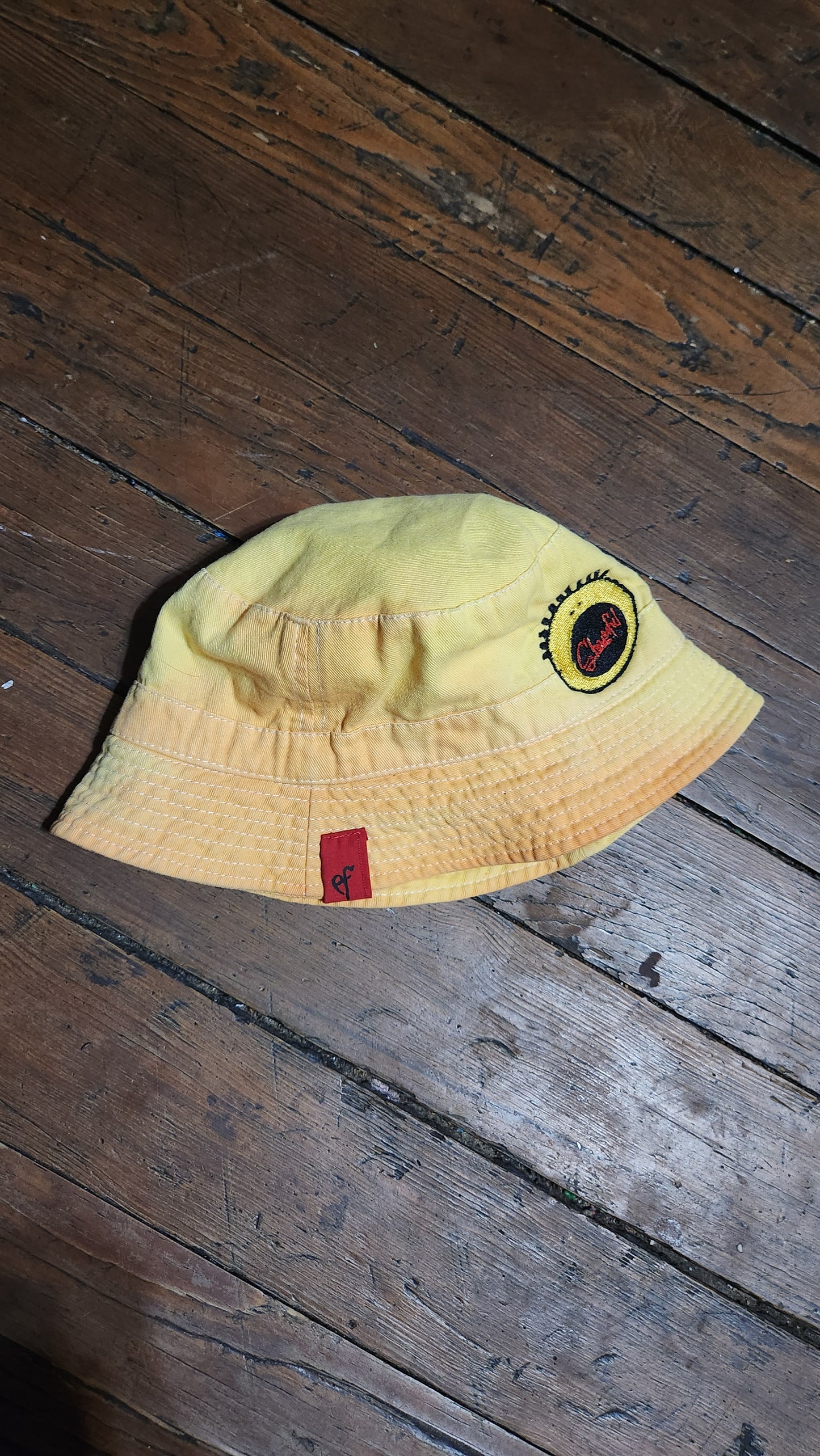 "ALL THAT" bucket hat yellow tye dye
