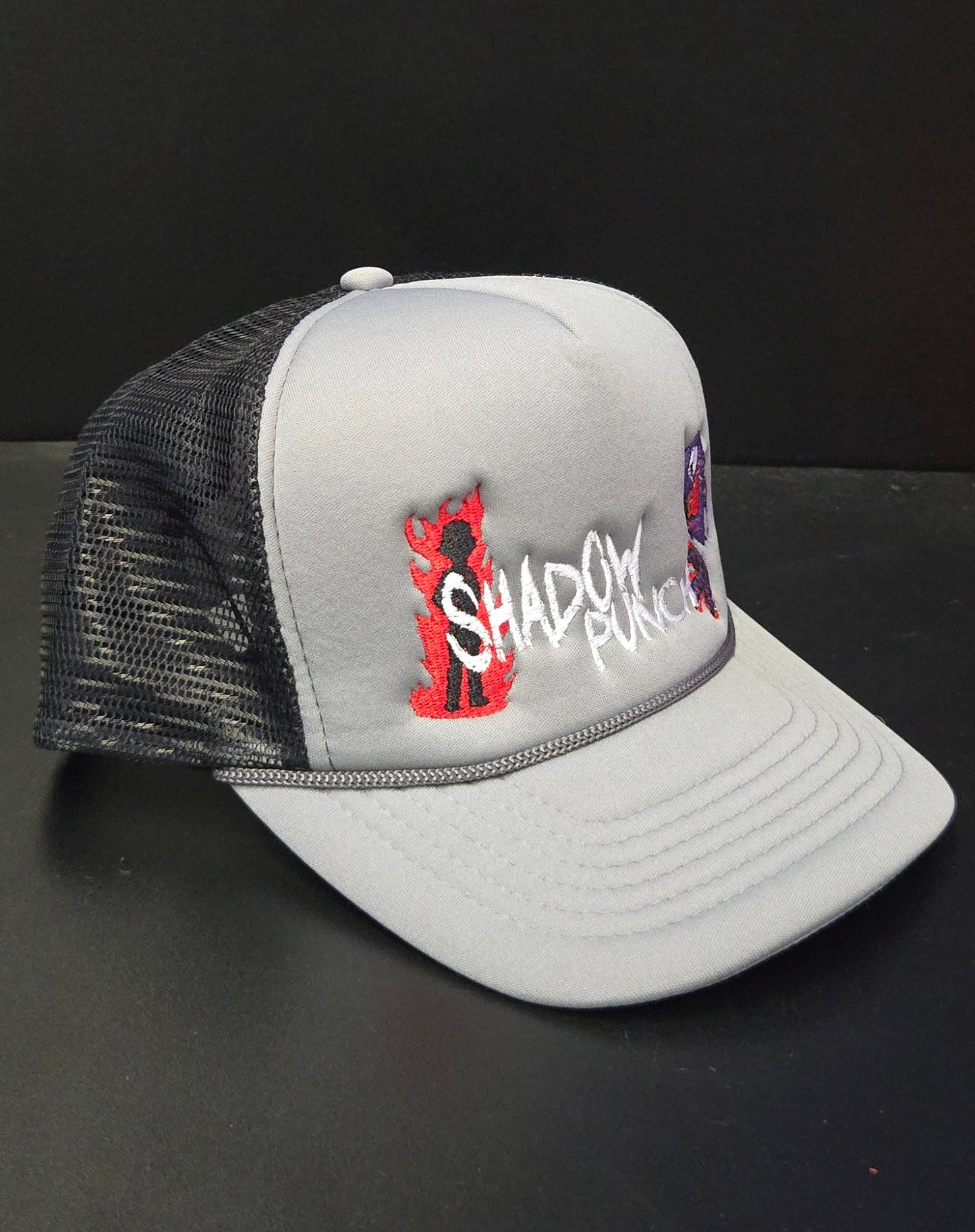 Shadow Punch Trucker Hat